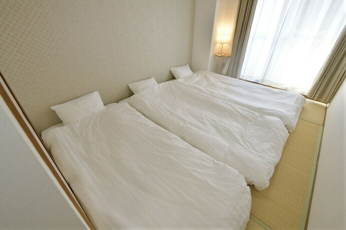 Imagen de la habitación del Hotel Jpride Uemachidai Condo. Foto 22