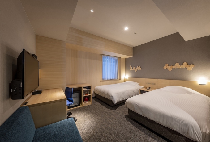 Imagen de la habitación del Hotel Jr Clement Inn Kochi. Foto 5