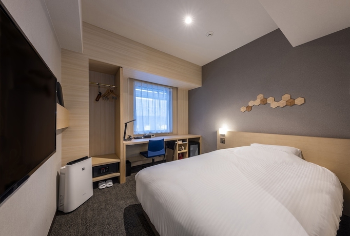 Imagen de la habitación del Hotel Jr Clement Inn Kochi. Foto 6