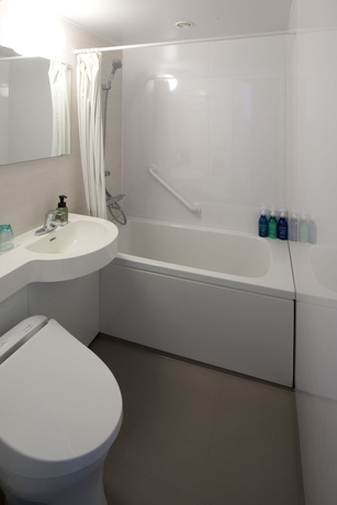 Imagen de la habitación del Hotel Jr Clement Inn Kochi. Foto 7