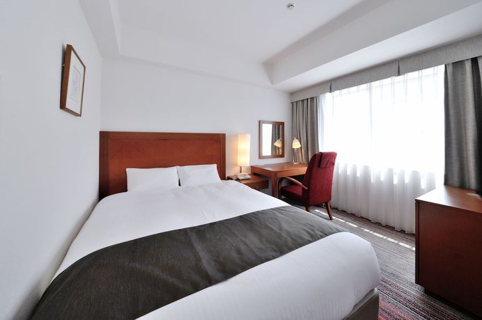 Imagen de la habitación del Hotel Jr Kyushu Station Kokura. Foto 4