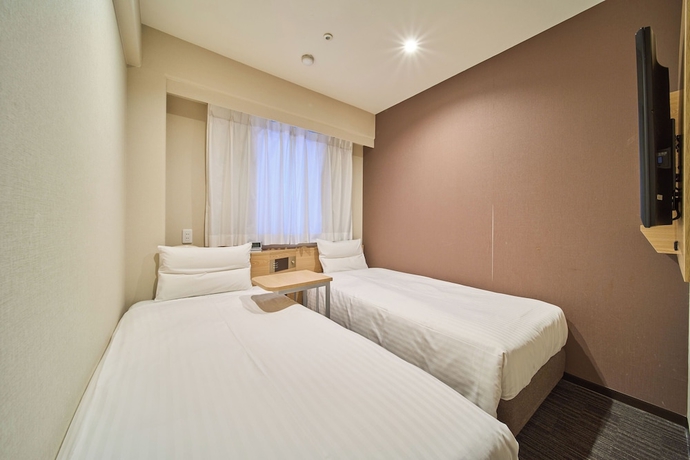 Imagen de la habitación del Hotel Jr West Group Via Inn Shinosaka West. Foto 9
