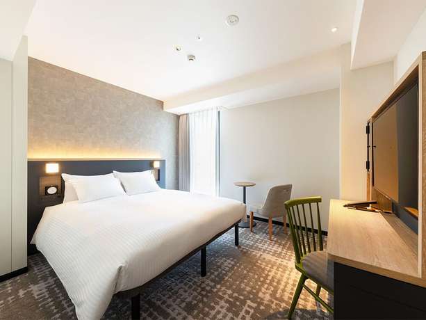 Imagen de la habitación del Hotel Jr-east Mets Yokohama. Foto 6