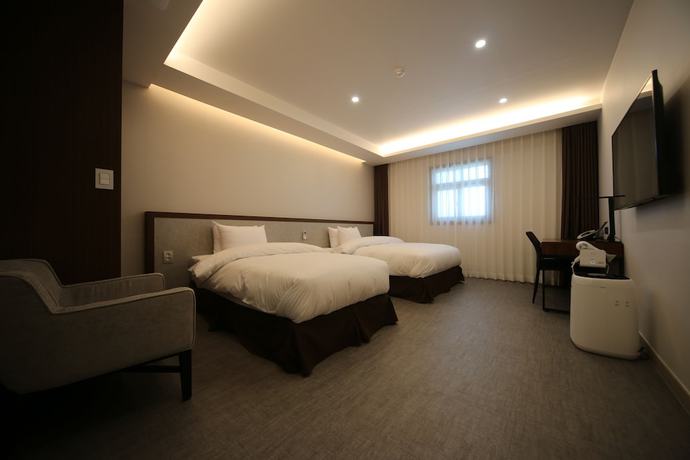 Imagen de la habitación del Hotel J\'s. Foto 3