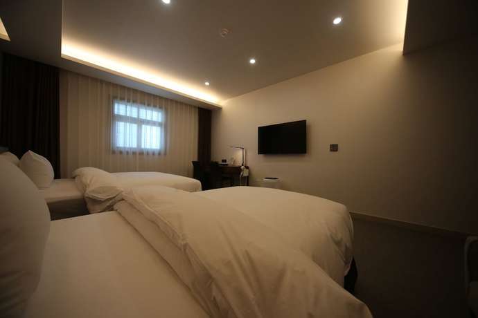 Imagen de la habitación del Hotel J\'s. Foto 4