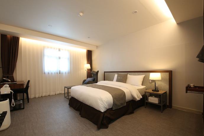 Imagen de la habitación del Hotel J\'s. Foto 12
