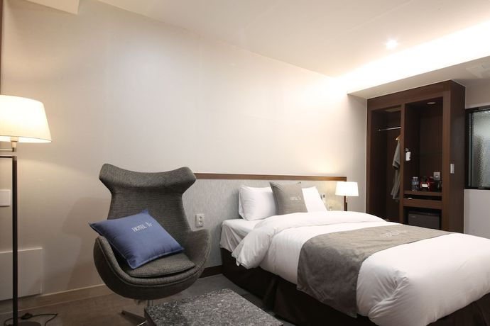 Imagen de la habitación del Hotel J\'s. Foto 13