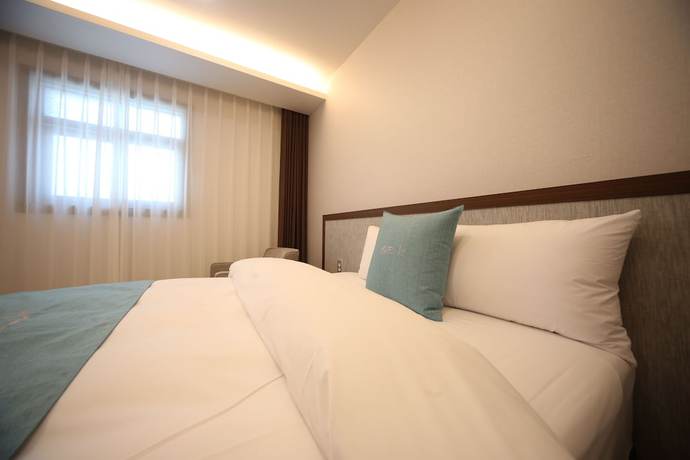 Imagen de la habitación del Hotel J\'s. Foto 16