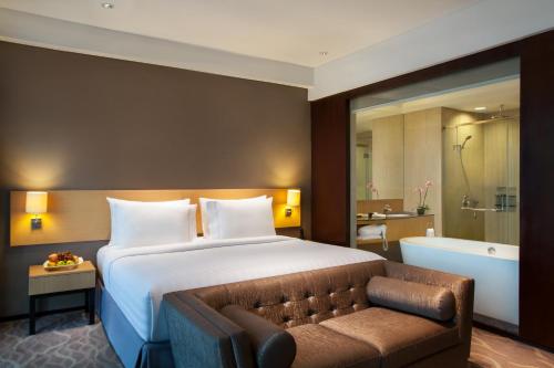 Imagen de la habitación del Hotel Js Luwansa and Convention Center. Foto 3