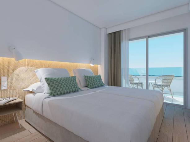 Imagen de la habitación del Hotel Js Portocolom Suites. Foto 22