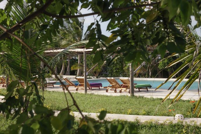 Imagen de la piscina del Hotel Jua Retreat. Foto 20