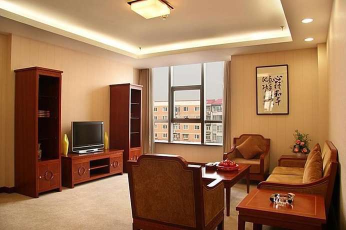 Imagen de la habitación del Hotel Judge Home Hotel - Beijing. Foto 2