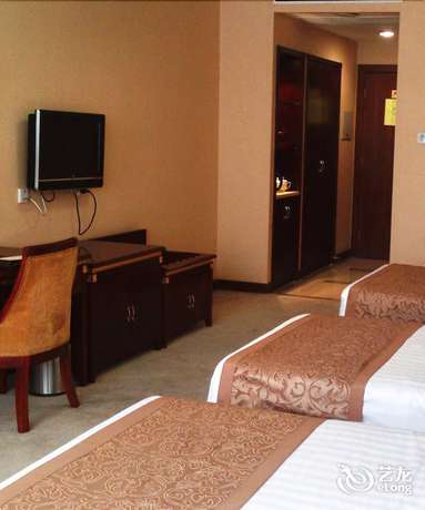 Imagen de la habitación del Hotel Judge Home Hotel - Beijing. Foto 5