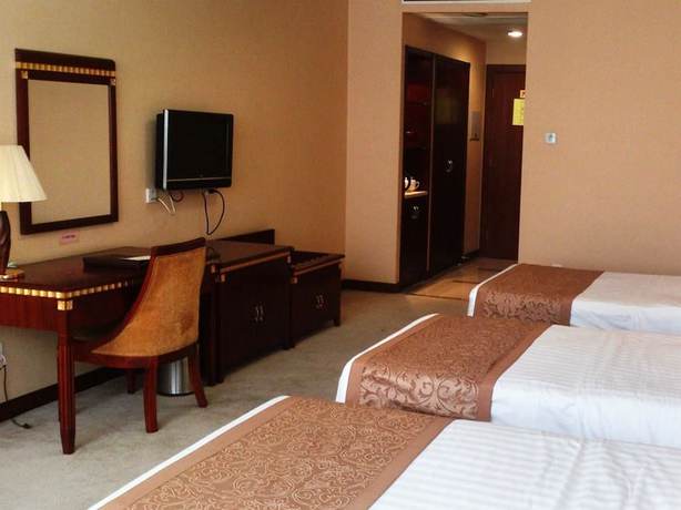 Imagen de la habitación del Hotel Judge Home Hotel - Beijing. Foto 6