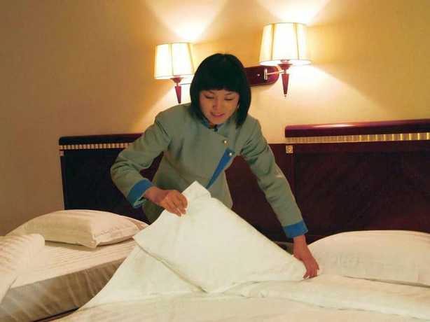Imagen de la habitación del Hotel Judge Home Hotel - Beijing. Foto 7