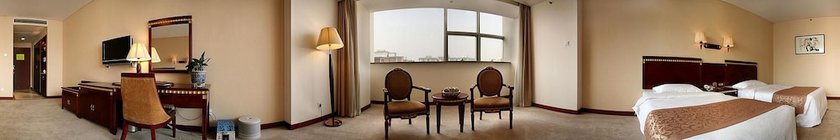 Imagen de la habitación del Hotel Judge Home Hotel - Beijing. Foto 9
