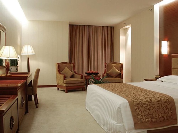 Imagen de la habitación del Hotel Judge Home Hotel - Beijing. Foto 10