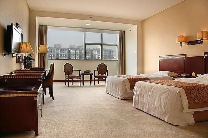 Imagen de la habitación del Hotel Judge Home Hotel - Beijing. Foto 13