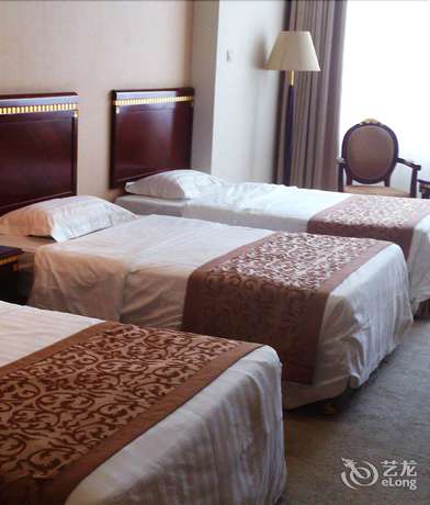 Imagen de la habitación del Hotel Judge Home Hotel - Beijing. Foto 15
