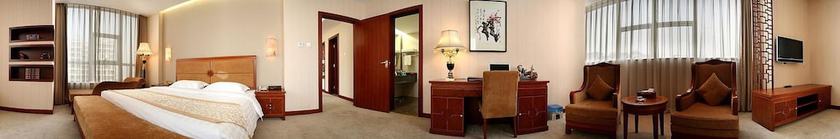 Imagen de la habitación del Hotel Judge Home Hotel - Beijing. Foto 16
