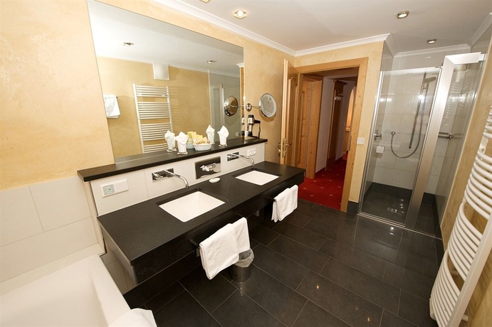 Imagen de la habitación del Hotel Jufa Alpenhotel Saalbach. Foto 4