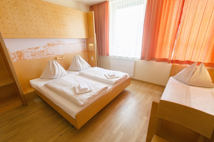 Imagen de la habitación del Hotel Jufa Salzburg. Foto 16