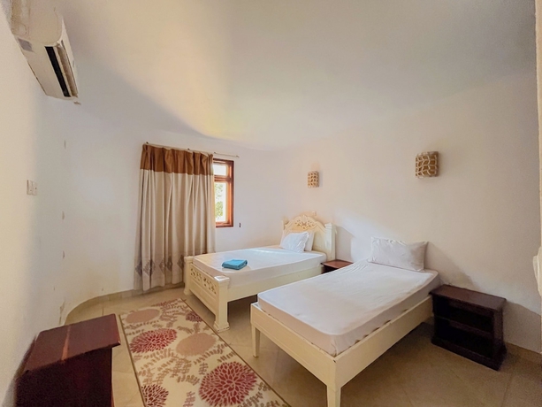 Imagen de la habitación del Hotel Jujo Beachfront Apartments. Foto 8