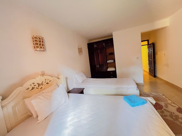 Imagen de la habitación del Hotel Jujo Beachfront Apartments. Foto 9