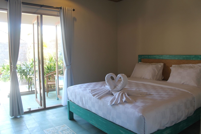 Imagen de la habitación del Hotel Jukung Guest House. Foto 13