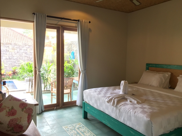 Imagen de la habitación del Hotel Jukung Guest House. Foto 15