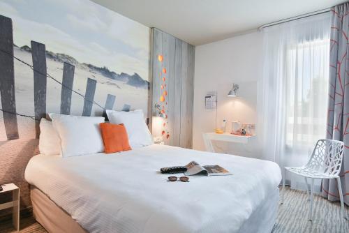 Imagen de la habitación del Hotel Jules Verne Biarritz, Bw Signature Collection. Foto 6