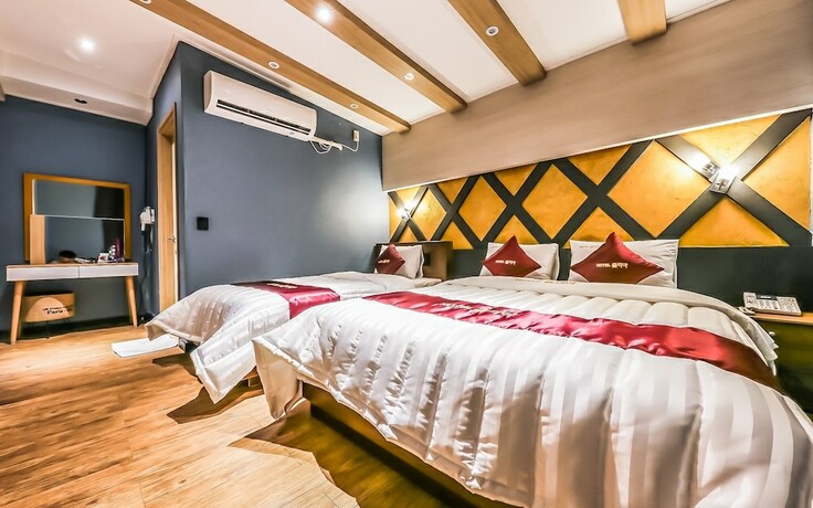 Imagen de la habitación del Hotel Julia Hongsung. Foto 15