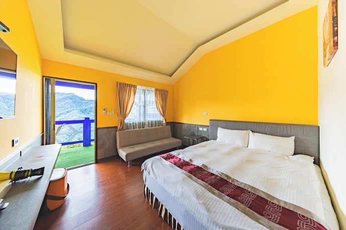 Imagen de la habitación del Hotel Julie\'s Garden. Foto 10