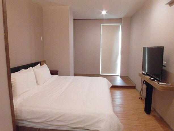 Imagen de la habitación del Hotel Julie's Garden Tainan. Foto 12