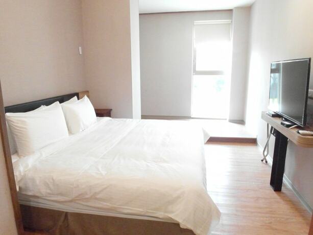 Imagen de la habitación del Hotel Julie's Garden Tainan. Foto 14