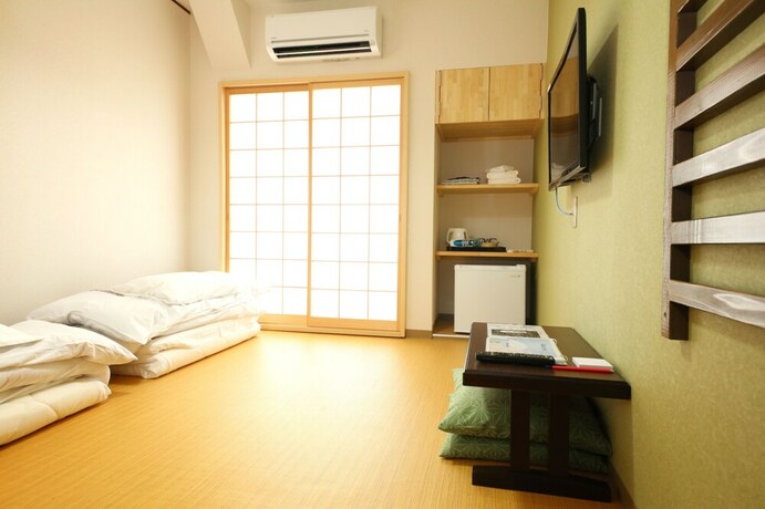 Imagen de la habitación del Hotel July. Foto 3