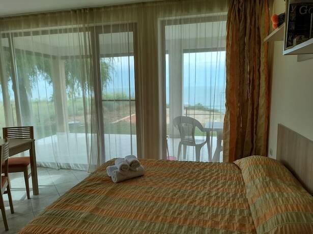 Imagen de la habitación del Hotel July Morning Seaside Resort. Foto 15