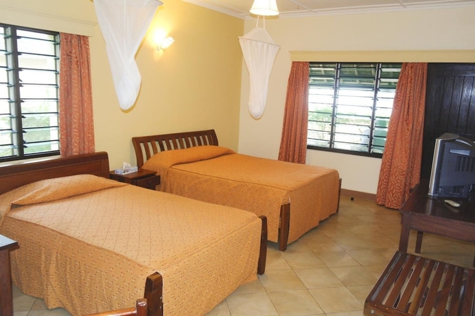 Imagen de la habitación del Hotel Jumuia Conference and Beach Resort. Foto 4
