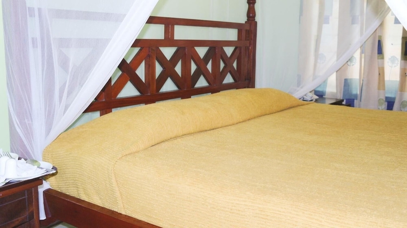 Imagen de la habitación del Hotel Jumuia Conference and Beach Resort. Foto 5