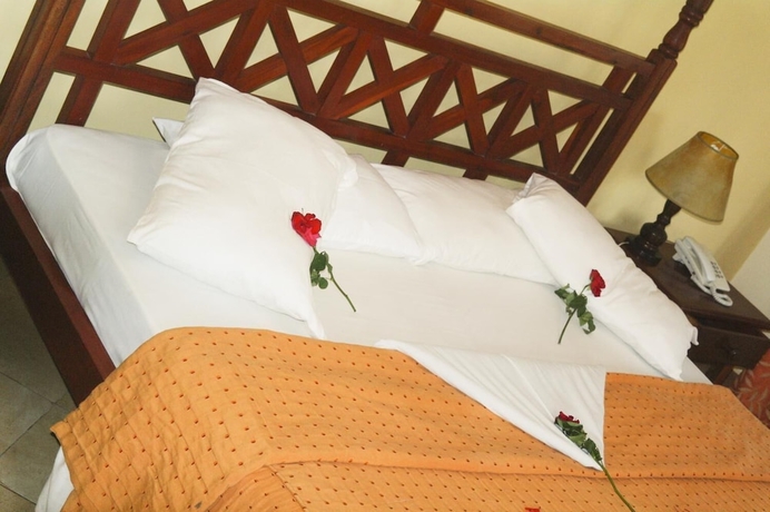 Imagen de la habitación del Hotel Jumuia Conference and Beach Resort. Foto 6