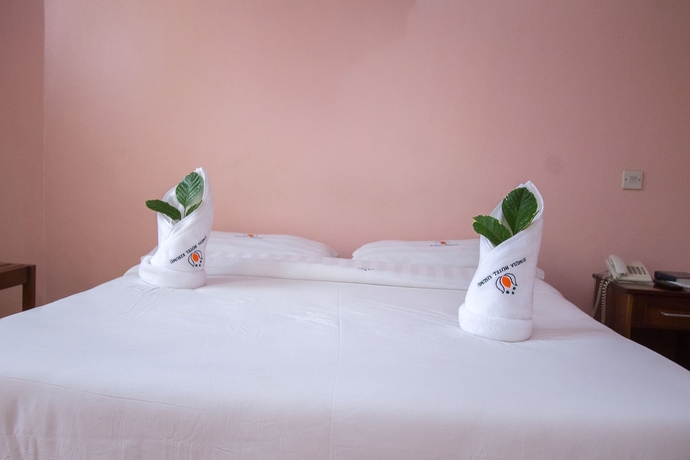 Imagen de la habitación del Hotel Jumuia Kisumu. Foto 18