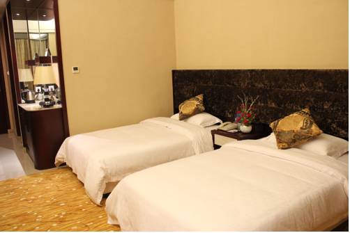 Imagen de la habitación del Hotel Jun Hao. Foto 2
