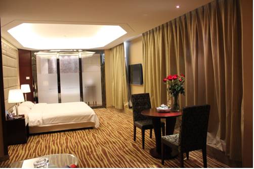 Imagen de la habitación del Hotel Jun Hao. Foto 6