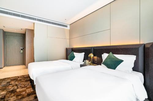 Imagen general del Hotel Jun Ming Happy World Yishang PLUS, Guangzhou. Foto 1
