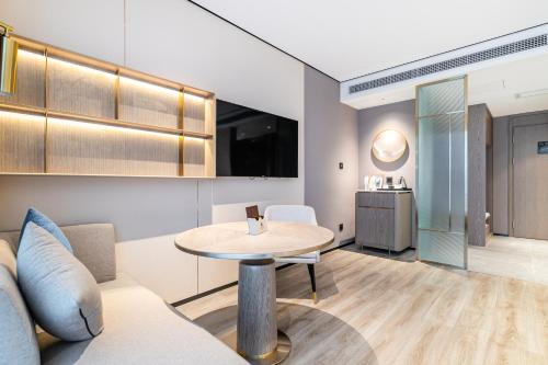 Imagen general del Hotel Jun Ming Happy World Yishang PLUS, Guangzhou. Foto 2