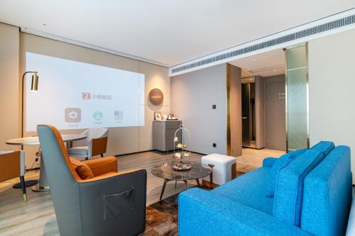 Imagen general del Hotel Jun Ming Happy World Yishang PLUS, Guangzhou. Foto 6