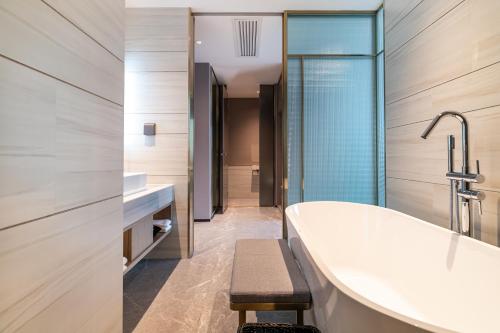Imagen general del Hotel Jun Ming Happy World Yishang PLUS, Guangzhou. Foto 8