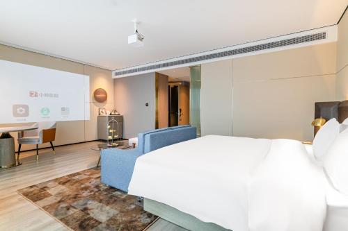 Imagen general del Hotel Jun Ming Happy World Yishang PLUS, Guangzhou. Foto 9