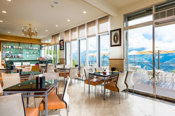 Imagen del bar/restaurante del Hotel Jun Yue Hanging Garden Resort. Foto 18