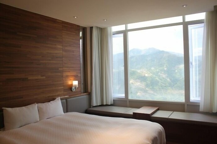 Imagen de la habitación del Hotel Jun Yue Hanging Garden Resort. Foto 21